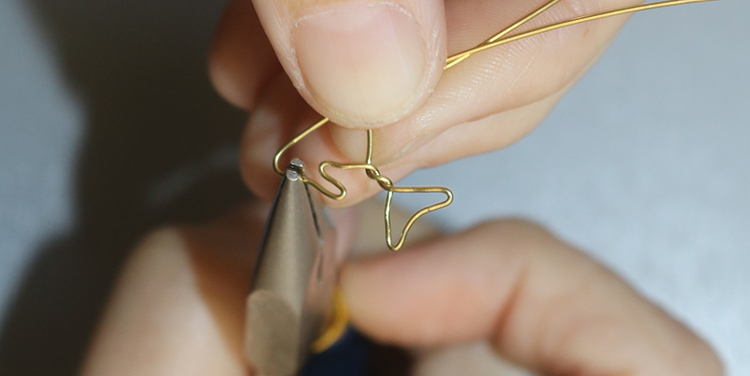 Fisch aus Draht und Nagellack