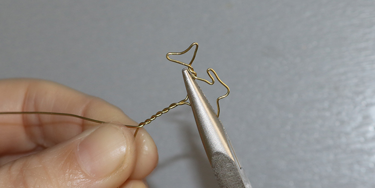 Fisch aus Draht und Nagellack