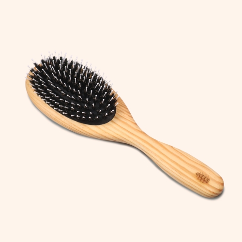 Care & detangling brush with wild boar bristles and pins with knobs